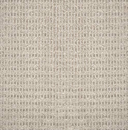 Beige solid distressed berber carpet