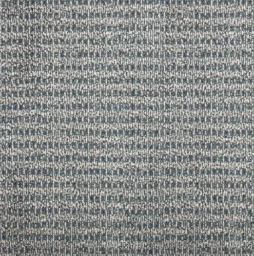 Medium blue solid distressed berber carpet