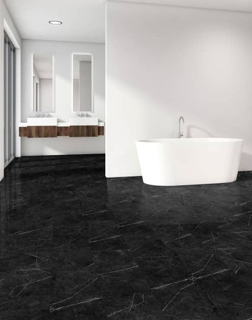Crisp, clean bathroom with white walls, wood accents, and black Marquina Nero Black marble-look LVT