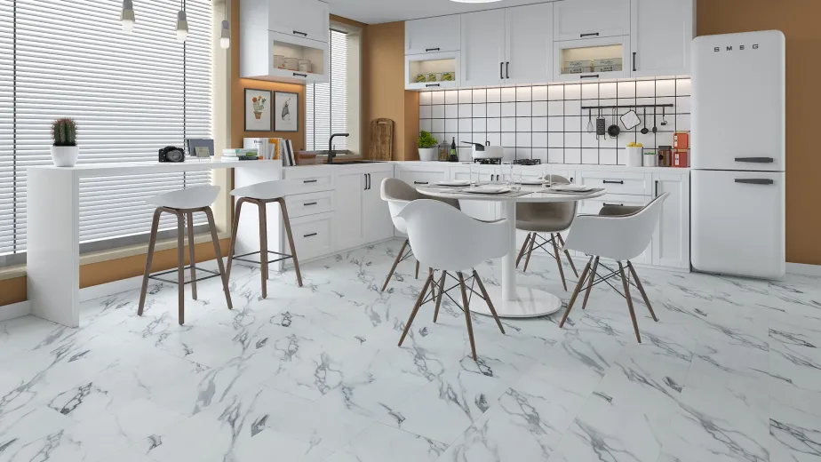 Retro-inspired kitchen with vintage fridge, white cabinetry, breakfast nook, and table over white and gray stone-look tile
