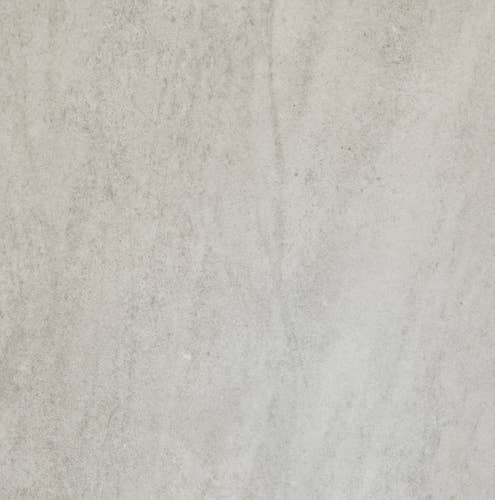 Stoneybrook Shadow luxury vinyl tile sample, showing light gray tonal variation and subtle stone texture