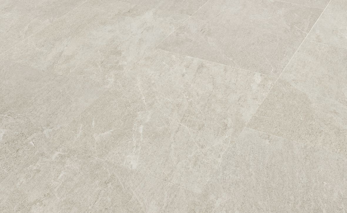 Sample of LVT Alpine Quartzite, with cool cream and white marbling