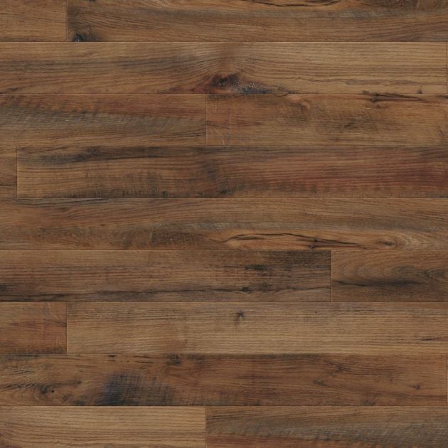Sample of Blended Oak, a brown luxury vinyl plank with tonal variation for depth and woodgrain detailing