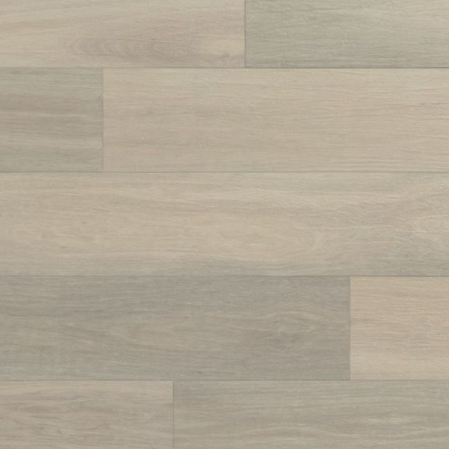 Sample of Glacier Oak, a luxury vinyl plank with woodgrain texture, knots, and gray and beige tonal variation