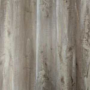 Tavern Oak luxury vinyl plank sample showing grays and taupes for a rustic, slightly weathered wood look