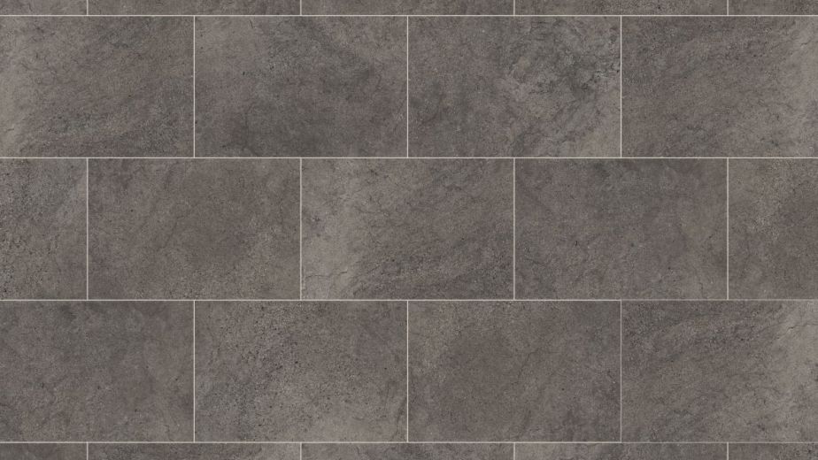 Cumbrian Stone LVT sample, a dark gray tile with a painted bevel edge