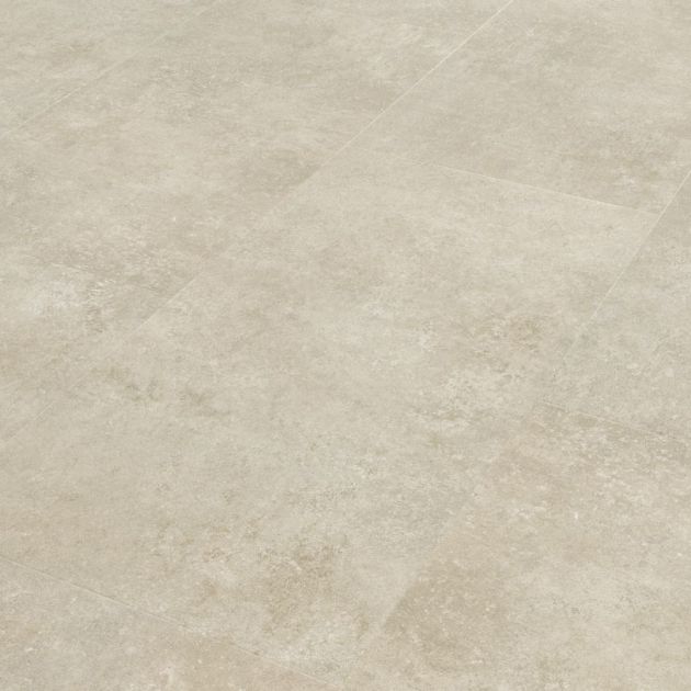 Sample of Pavimento Crema, a rectangular cream concrete-look tile with touches of beige