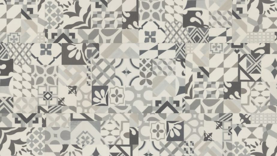 Sample of LVT Casablanca, a patchwork pattern composed of various geometric and architectural curves in gray tones
