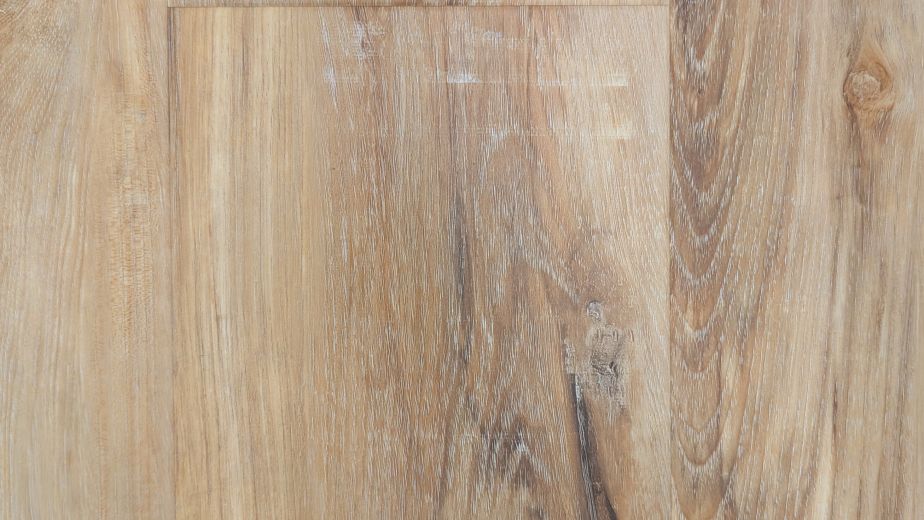 Sample of Hawthorne Grain LVP showing its golden brown tones, gently distressed details, and woodgrain texture