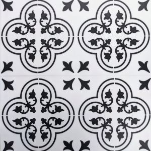 Valencia Aurora luxury vinyl tile featuring black and white gothic-inspired ironwork floral design