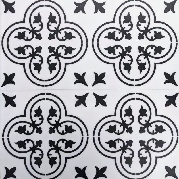 Valencia Aurora luxury vinyl tile featuring black and white gothic-inspired ironwork floral design