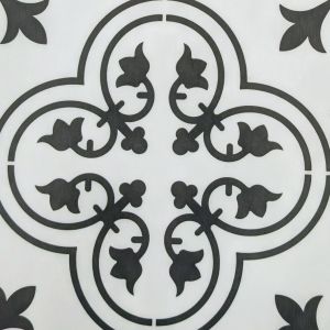 Sample of Valencia Aurora LVT showing black gothic, floral design on white background
