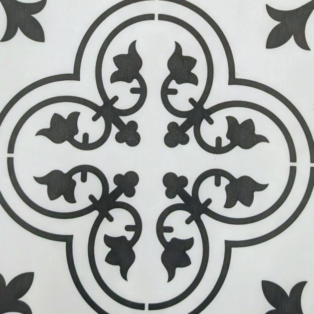 Sample of Valencia Aurora LVT showing black gothic, floral design on white background