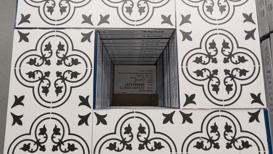 Valencia Aurora LVT samples arranged on top of stacked boxes