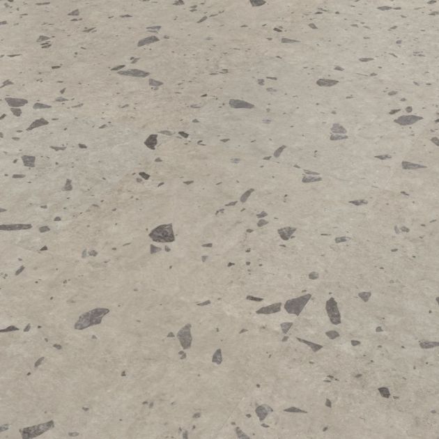 Luca LVT sample, a gray terrazzo style tile flecked with darker gray and brown spots