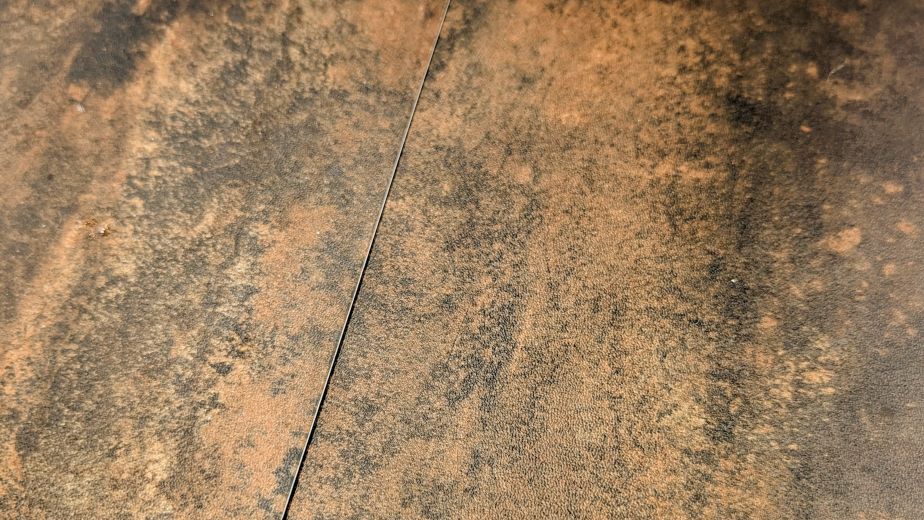 Opus Russus sample, a slate look featuring reddish brown and charcoal tones