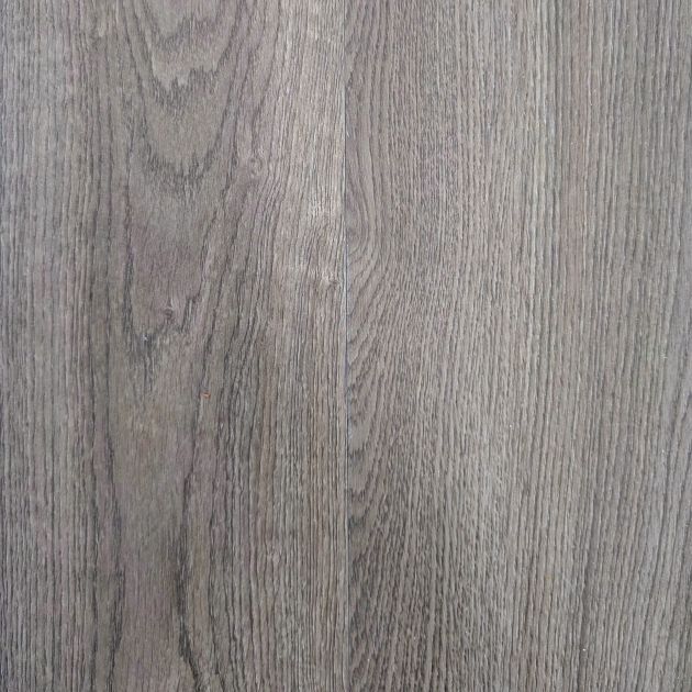 Arbor glue down luxury vinyl plank sample showing woodgrain design, brown tones, and subtle warm undertones