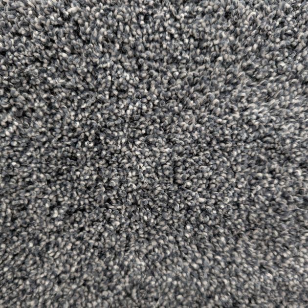 PM4098 plush carpet sample showing twisted steel blue colored fibers and texture