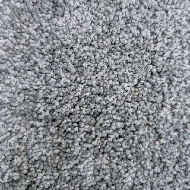 Close up of Throne Bluestone carpet highlighting plush texture, grayish blue color, and slight sheen