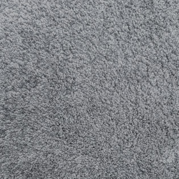 Sample of Throne Bluestone, a plush grayish blue carpet with slight lustrous shine