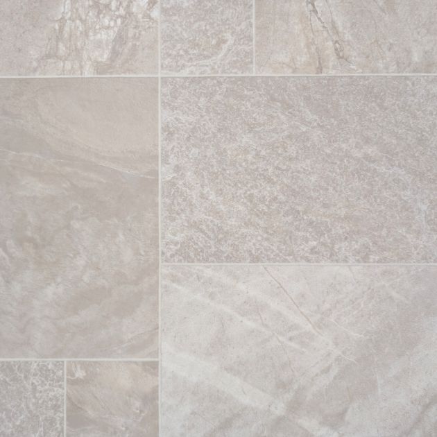 Seattle Dune luxury vinyl sheet sample, a taupe rectangular and square grouted tile design