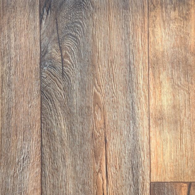 Sample of Odyssey Oak Coffee luxury vinyl sheet, a woodgrain design with warm brown tones